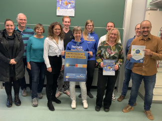 Elf Personen beim Stammtisch für MINT-Lehrkräfte in NRW